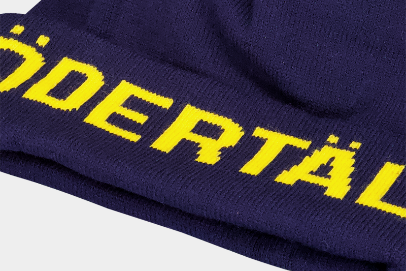 Hockey beanie pom pom marinblå